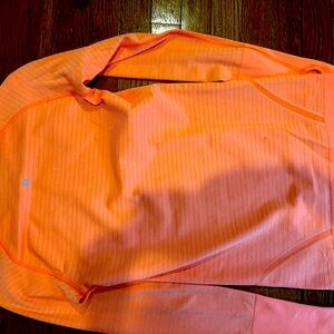 Bright orange Lululemon swiftly long sleeve
